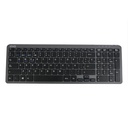 Teclado Inalámbrico Cygna Slim Grafito - a clean white desk with a mouse and notebook